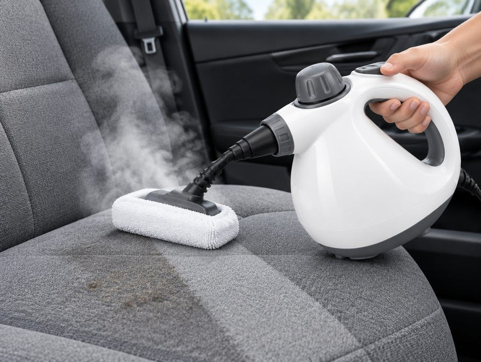 Steaming a fabric car seat with the pad attachment