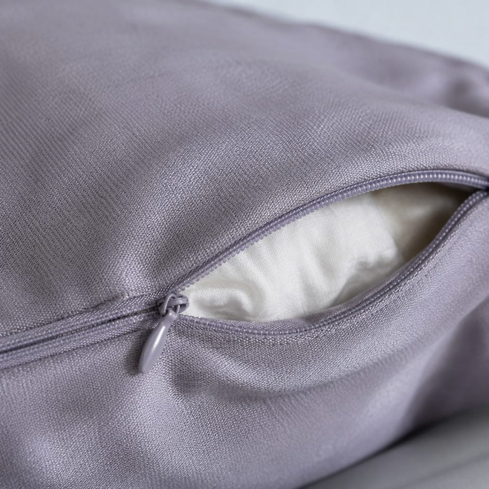 Close-up of the cool-touch knit cover and its zip